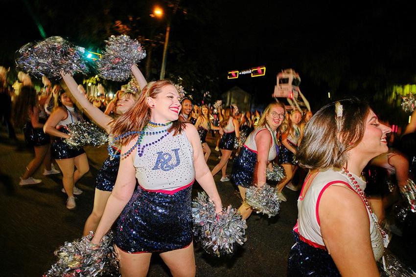 South Alabama Cheer with beads from Mardi Gras Celebration