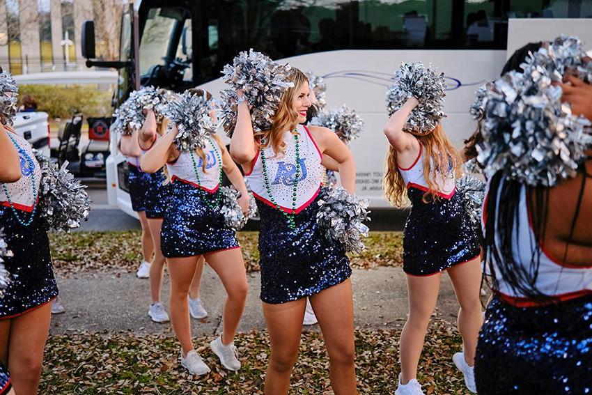 South Alabama Cheer with their pom poms